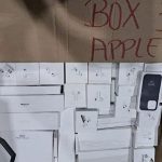 Apple pallet liquidation warehouse with boxed Apple electronics ready for shipping